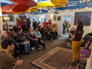 Poet Morgan Paige reads to a crowd at Birdhouse Books in downtown Vancouver