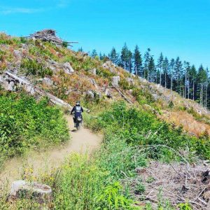 motobiker on the Rock Candy trail in the Capitol Forest