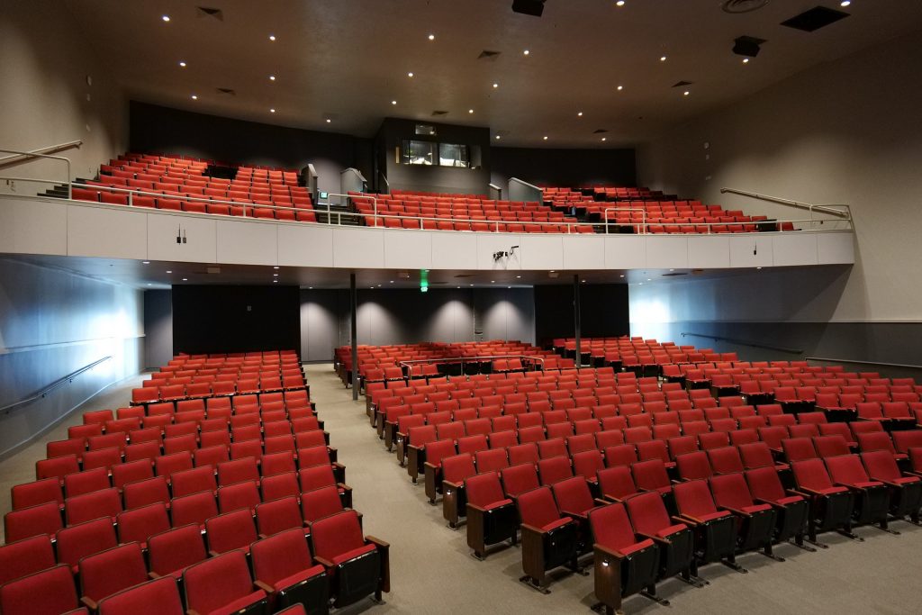 empty red seats of the Joyce Garver Theater