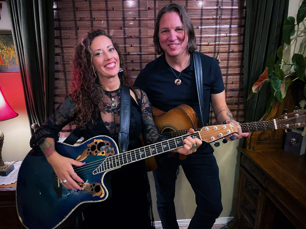 Stephanie (left) and Christopher Corbell, founders of Washougal Songcraft Festival, both with guitars in hand