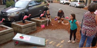 kids Playing Tropical Toss-it-In at August First Friday in Camas 2021