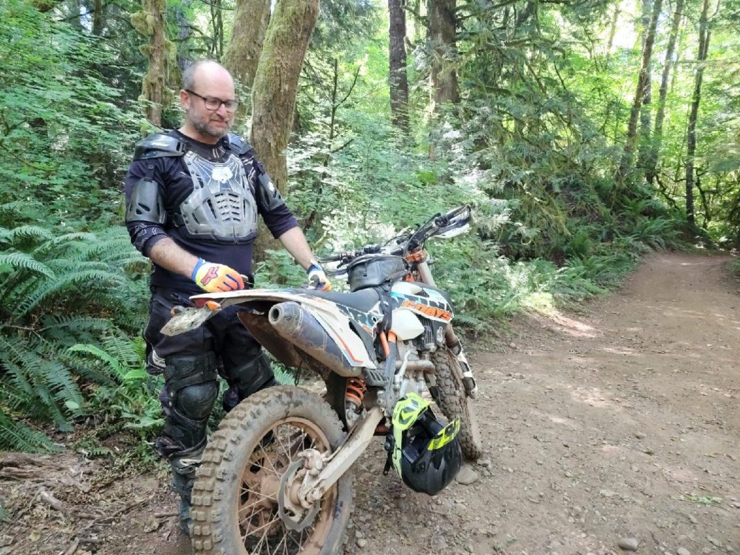 motobiker on the Rock Candy trail in the Capitol Forest