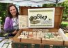 Gail Horn, owner of The Soap Chest in Camas, next to a display of her soaps