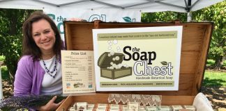 Gail Horn, owner of The Soap Chest in Camas, next to a display of her soaps
