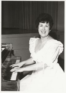 Joyce Garver playing the piano