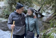 Szue and Frank Juhasz hiking in the snow in the Olympic Peninsula